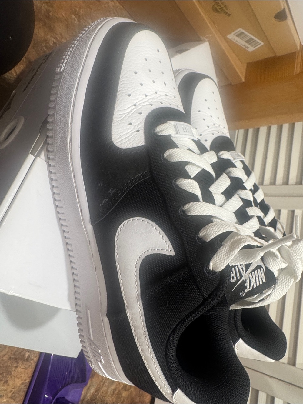 Nike Black and White Low-Top Sneakers with Iconic Swoosh